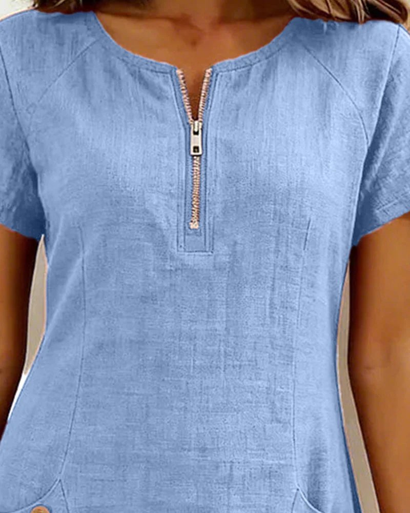 Ainhoa | Vestido de corte A con mangas cortas, bolsillo y cremallera.